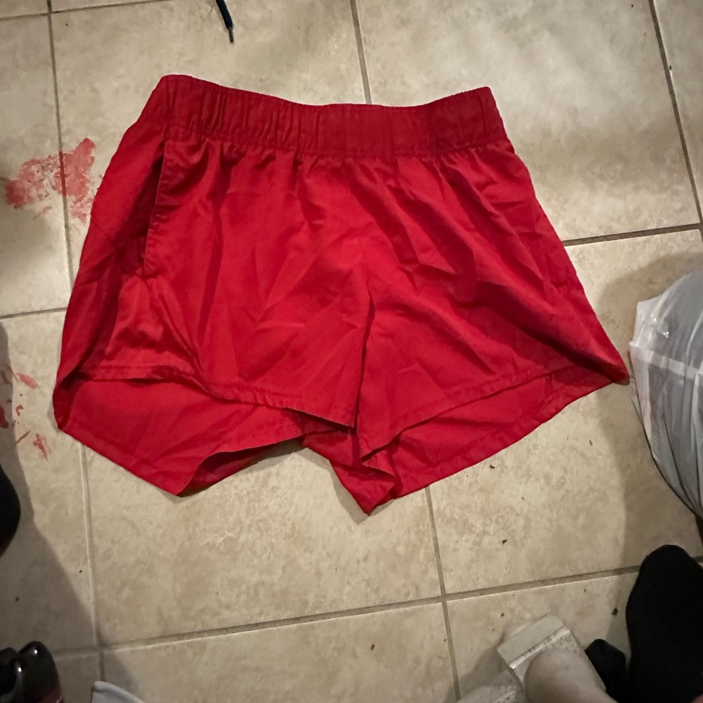 red athletic shorts